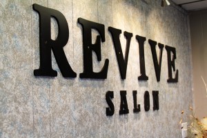 Revive Salon Interior sign